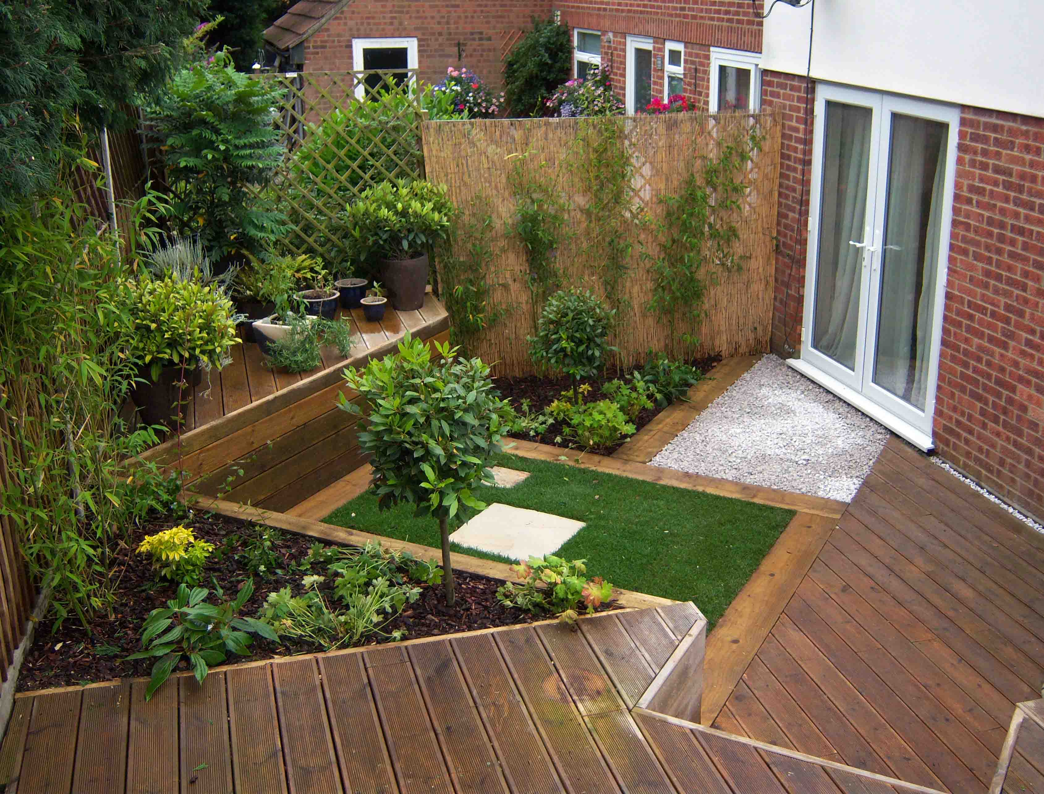 Wildlife pond full of flowers and with seating and enclosed areas